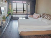 青岛蓝色海湾度假公寓 - 豪华海景大床房