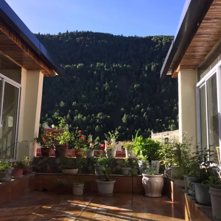 Mingcai Hotel (Siguniangshan Scenic Area)
