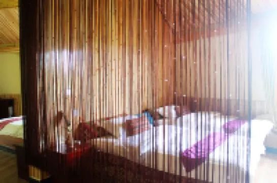 Mengla Bajiaolou Inn