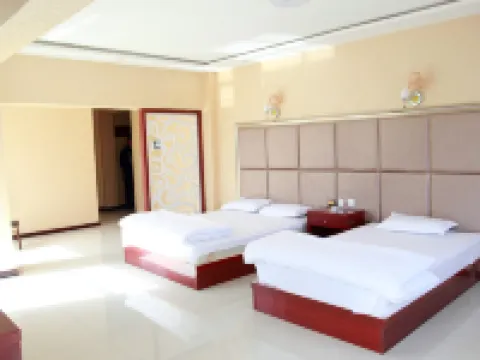 粛南ユグル族自治県裕鑫ビジネスホテル 粛南ユグル族自治県のホテル