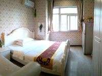 重庆艾鑫主题酒店式公寓 - 温馨大床房