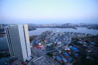 Sunny Sky Inn Huanggang Spreading Love Lake Park Hotel di Huanggang