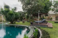 Villa Costa Sanur - سرير ووجبة إفطار