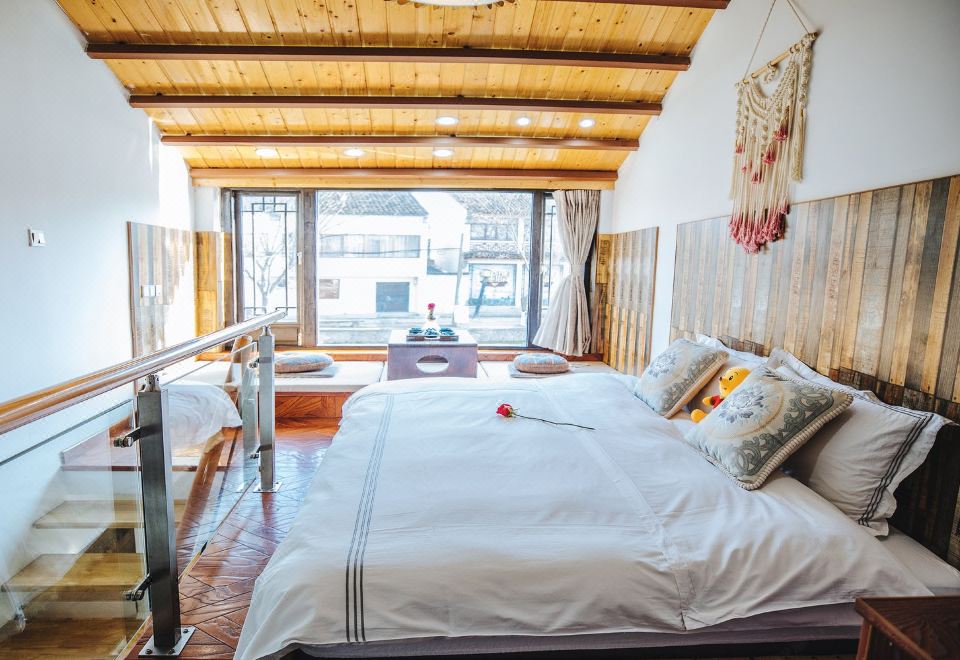 Tongli Qingyuan River View Holiday Inn의 편안한 로비 공간