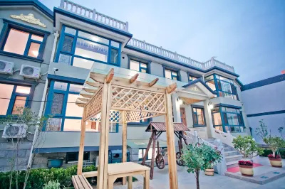 Garden Memory Guesthouse Отели рядом с достопримечательностью «Пекинская Институт образования (Цзянцинская кафедральная кафед»