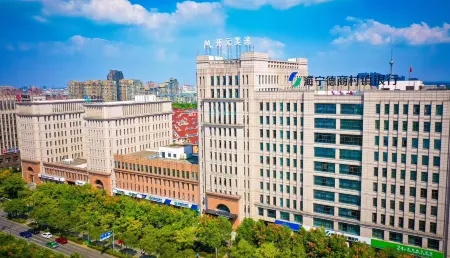 Maytour Hotel(Leather City Yintai City Store) Отели рядом с достопримечательностью «Former residence of Zhimo Xu»