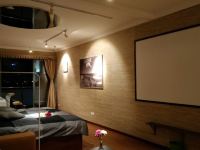 上海滩景公寓(12号店) - 精致家庭影院一室大床房