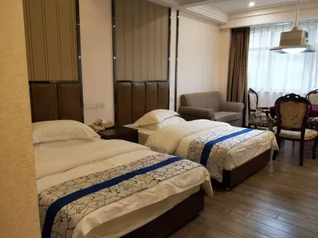 Quxian Nandu Hotel Отели рядом со станцией Qu County Railway Station