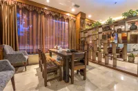 Jinting Chain. Via Boutique Hotel (Deyang Moore Shopping Plaza) - salle de sport