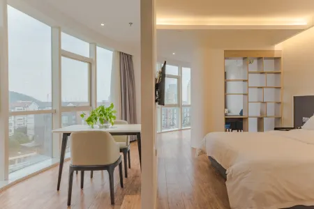 Huanlesong Hotel Отели рядом с достопримечательностью «Pinghu Mo's Manor»