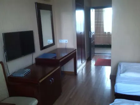 Xinjia Hotel Отели рядом с достопримечательностью «Сяо Хуан-Сун»