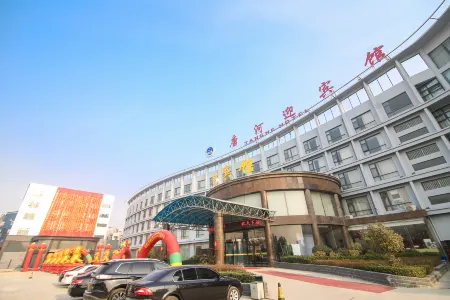 Tanghe Hotel Отели в г. Танхэ
