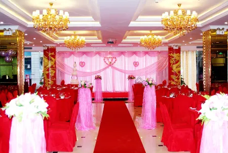 Huasheng Hotel Отели рядом с достопримечательностью «Golden Rooster Ridge»