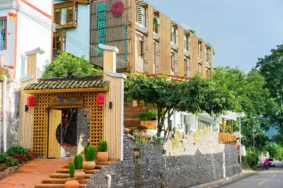 Wanfeng Linjingtang Holiday Hostel Отели в г. Синъи