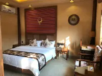 Fuchuan Thatched Cottage Resort