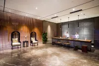 Yijia Bauhinia Hotel - Bergblick