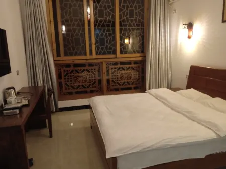 Lingchuan Guyun Chinese Inn (Daxu Ancient Town) Отели в г. Линчуань