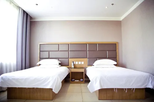Shawan Qixing Business Hotel - parking