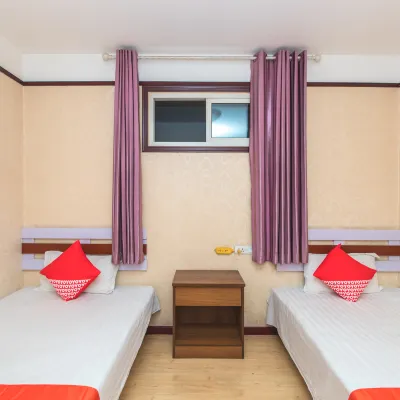 Jiaozhou yingxiang business hotel Отели рядом с достопримечательностью «Новый век торговый центр»
