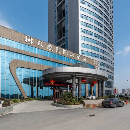 Donghuang International Hotel Отели в г. Синьхуа
