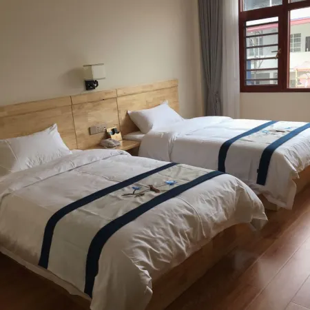 Longzhou Taida Hotel