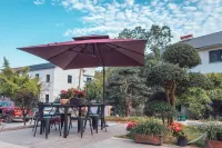 Zuoshangyun Guesthouse Отели рядом с достопримечательностью «Парк Цзиньцзинь»