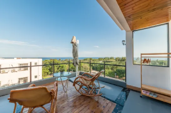 Anzhi Ruosu Hotel Hotel berhampiran Wucai Beach