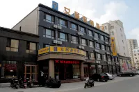 艾居チェーンホテル（蓋州中心医院火車駅） のホテル