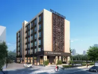 โรงแรมเรดดิงแมน (มหาวิทยาลัยเซี่ยงไฮ้ เจียวถัง) โรงแรมใกล้Shanghai Jiaotong University Minhang Campus Stadium