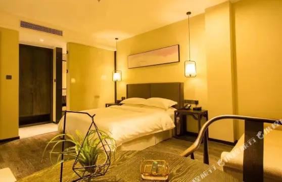 定南七葉精品酒店