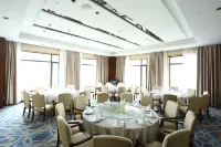Xinchang Wozhou Junyi Hotel - servizio colazione