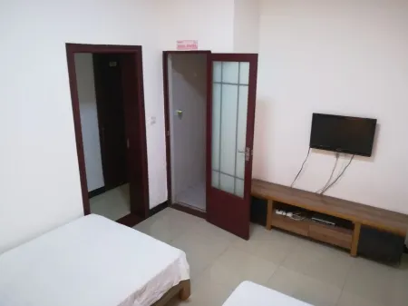 Yigang Hostel Отели в г. Баоин