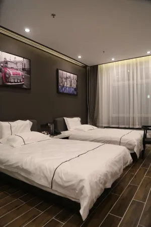 Shou Cheng Hotel Select Отели рядом со станцией Mishan Railway Station