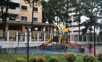 There is a playground in front of the apartments and buildings, providing a play area for children at Covillea Bukit Jalil Room
