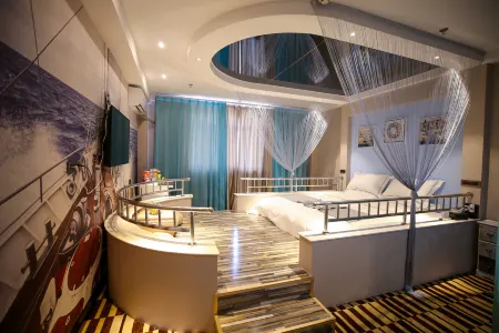 Gumo Impression Boutique Hotel Отели рядом с достопримечательностью «Xinjiang Institute of Technology»