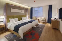 Qianna Hotel (Xinxiang Hualan Avenue Pangdonglai Shopping Plaza) Hôtels à : Xinxiang