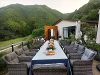 Xinchang Seven Semi Art Houses Hotels near Xiaohuangshanda Canyon Drifting