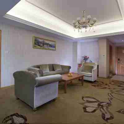 維也納酒店(龍海角美萬益廣場店) Rooms