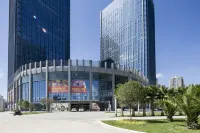 Kunming Jinglian Residence 신야저우/신아주 체육도시 호텔