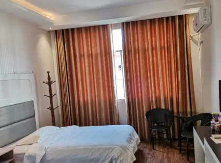 Cenggong Xinxing Inn Отели рядом с достопримечательностью «Cengong Longyi Tianjie Pedestrian Street»