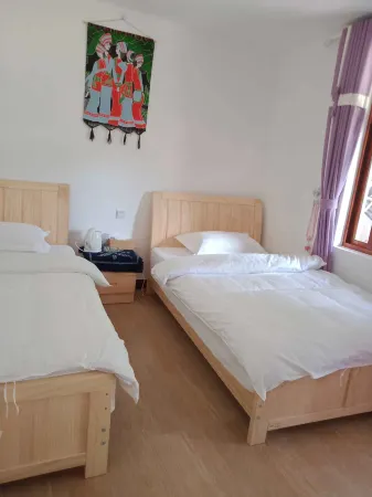 Nuodeng Ling'erling Hostel Отели в г. Юньлун