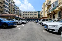 Yake Town Holiday Hotel - Bãi đậu xe