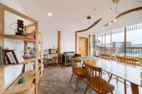 Jiuqi Xijiang Qijian Hostel - Yolcu Alma/Bırakma Hizmetleri