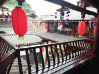 Yi Ni A Ge Inn فنادق في تشيوبَي