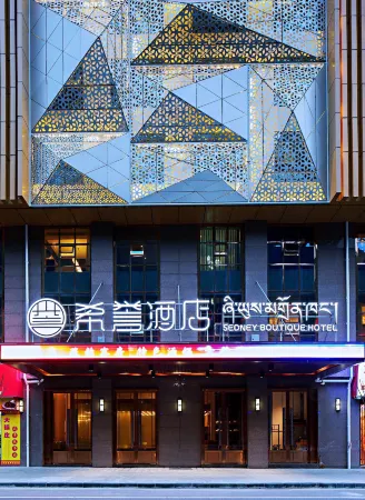 Sedney Hotel Отели рядом с достопримечательностью «Mugecuo»