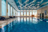 Longkou Nanshan Zhonggao Association International Training Center Отели в г. Лункоу