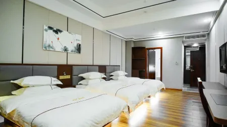 Jinggu Weijiangyuan Hotel Отели рядом с достопримечательностью «Mengwozongfu Temple»