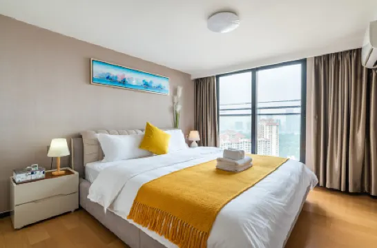 Xiangweiya Apartment Отели рядом с достопримечательностью «Chimelong Paradise»