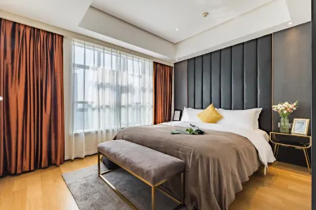 TF Suites Отели рядом с достопримечательностью «Chengdu Polytechnic Qingyang Campus»