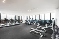 Sky One Apartments by CLLIX - Gym